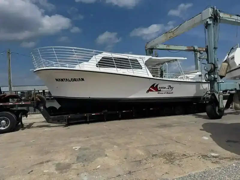 Old boat being hauled away for eco-friendly disposal